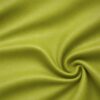Soft faux leather in apple green laid in soft folds