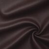 Soft faux leather in coffee laid in soft folds