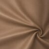 Soft faux leather in nougat laid in soft folds