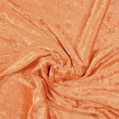 Nervöös samettineulos lohenvärinen -- joustava polyesteriveluuri lämpimän rosa-oranssina