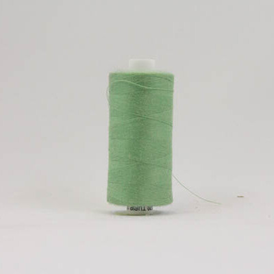Sewing thread faded green - Image 1