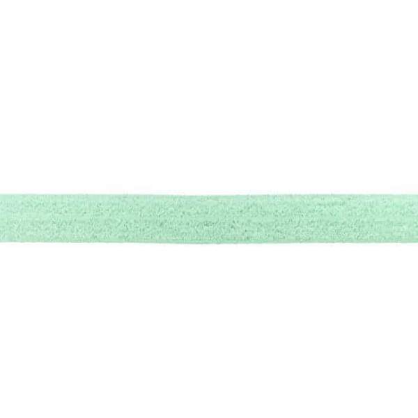 32255.jpg Fold-over elastic with glitter in dusty green, 2 cm wide