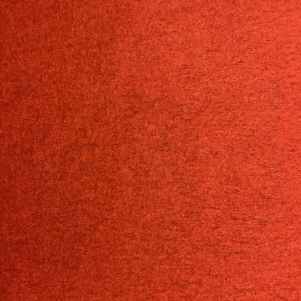Close-up of Italian wool felt burnt orange - boiled wool bouclé