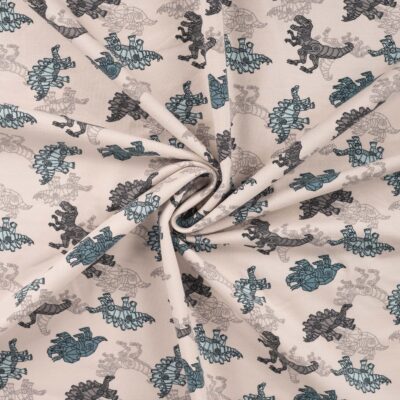 Ranskalainen froteeprintti, jossa on dinosaurus