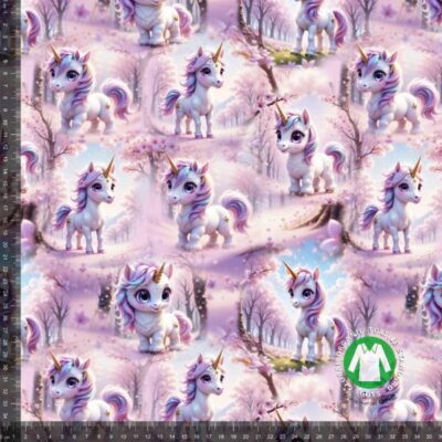 Jersey print med søde lyserøde enhjørninger digitalprint jersey 220 g/m²