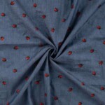 Chambray-kangas, jossa on kirjailtuja leppäkerttuja