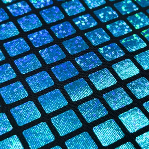 Aqua foil surface with squares on leggings foil 160 g/m²
