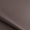 Close-up of the surface of soft faux leather in greyish brown