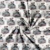 Patchwork cotton with irons and roses motif, densely woven and soft