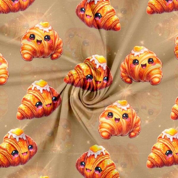 Digital print jersey fabric with croissant print on sand background