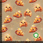 Jersey print med søde glimtende croissanter - sand