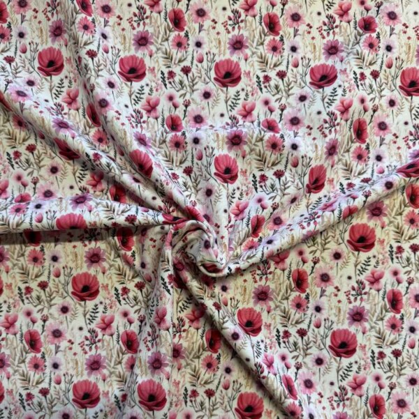 Detail of light pink floral print on single jersey knit cotton/lycra