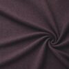 Textured upholstery fabric in aubergine laid in soft folds