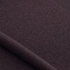 Close-up of the surface of textured upholstery fabric in aubergine