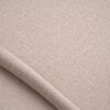 Close-up of the surface of textured upholstery fabric in beige