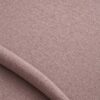 Close-up of the surface of textured upholstery fabric in dusky old pink