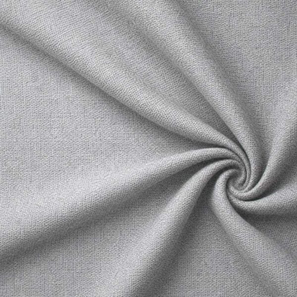 Textured upholstery fabric in grey laid in soft folds