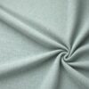 Textured upholstery fabric in mint laid in soft folds