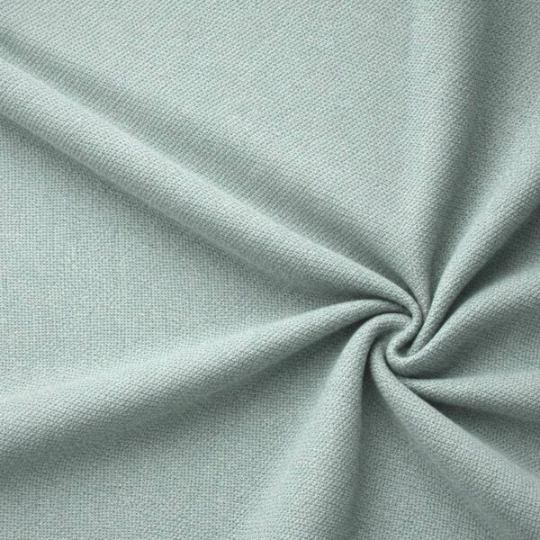 Textured upholstery fabric in mint laid in soft folds