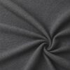 Textured upholstery fabric in dark grey laid in soft folds