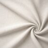 Textured upholstery fabric in off-white laid in soft folds