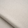 Close-up of the surface of textured upholstery fabric in off-white
