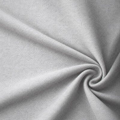 Textured upholstery fabric in silver laid in soft folds
