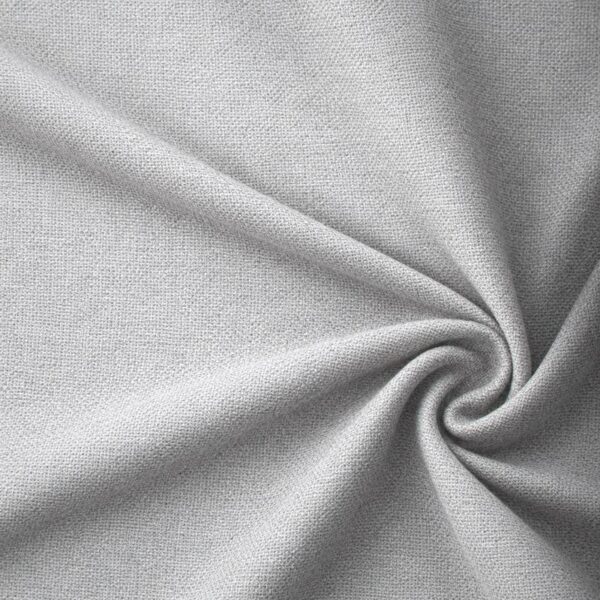 Textured upholstery fabric in silver laid in soft folds