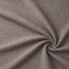 Textured upholstery fabric in taupe laid in soft folds