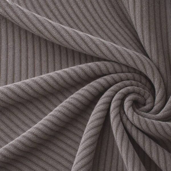Corduroy upholstery velour in ash grey laid in soft folds
