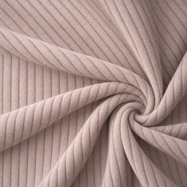 Corduroy upholstery velour in dusky old pink laid in soft folds