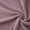 Corduroy upholstery velour in old rose laid in soft folds