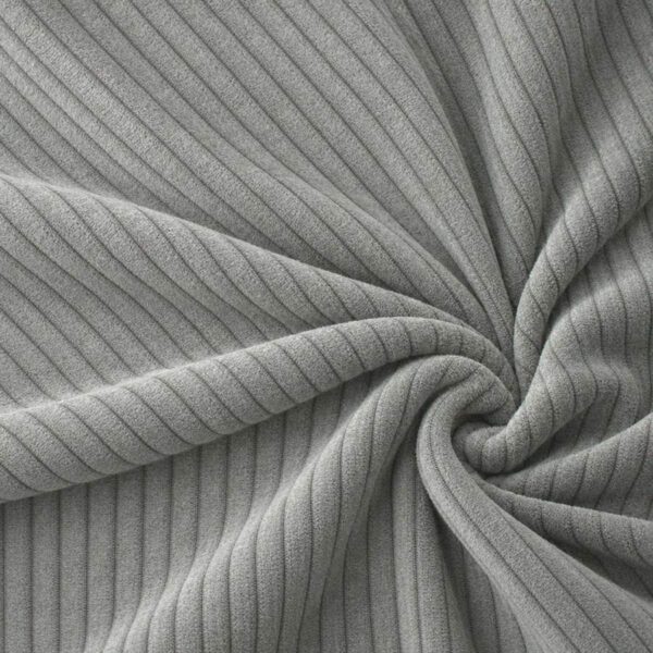 Corduroy upholstery velour in grey laid in soft folds