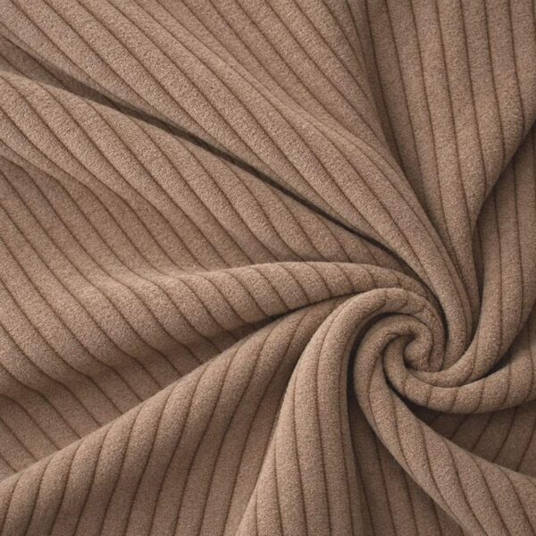 Corduroy upholstery velour in caramel laid in soft folds