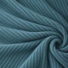Corduroy upholstery velour in light petrol laid in soft folds