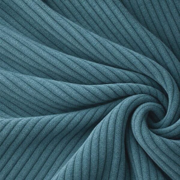 Corduroy upholstery velour in light petrol laid in soft folds