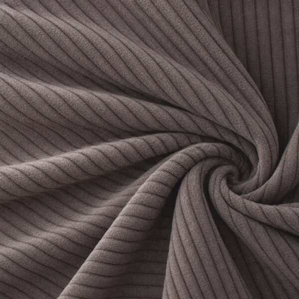 Corduroy upholstery velour in mocha laid in soft folds