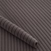 Close-up of the surface of corduroy upholstery velour in mocha