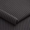Close-up of the surface of corduroy upholstery velour in dark grey