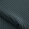 Close-up of the surface of corduroy upholstery velour in petrol