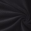Corduroy upholstery velour in black laid in soft folds