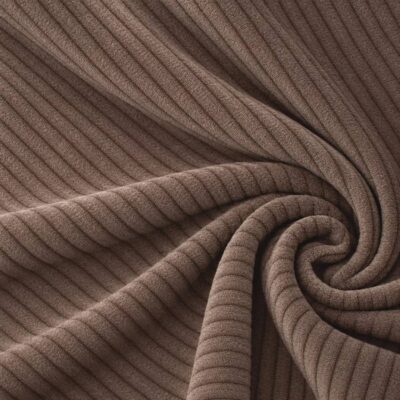 Corduroy upholstery velour in taupe laid in soft folds