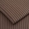 Close-up of the surface of corduroy upholstery velour in taupe