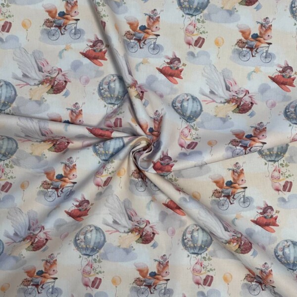 Detalje af vævet poplin patchwork med dyremotiv, 150 cm bred