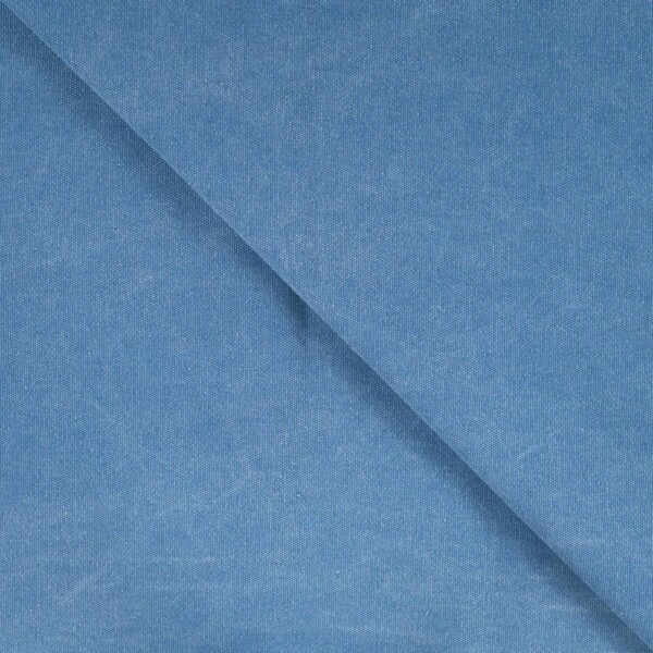 Close-up of Waxed Canvas Lapis Blue wax finish