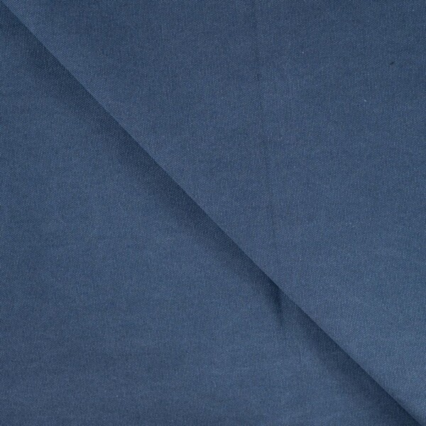 Nærbillede af Waxed Canvas Denim voksfinish og struktur