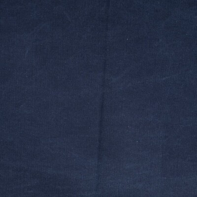 Waxed Canvas Navy surface with waxed finish close to