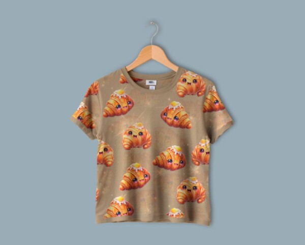 Digitalprint jersey stof med croissant print på sandfarvet bund