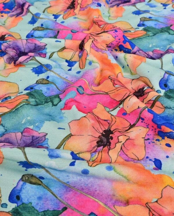 Detalje af bambus jersey med elegante blomster print i turkis