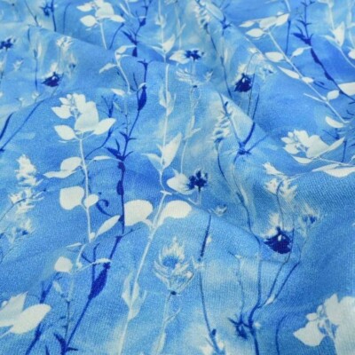 French Terry print med blomster - blå